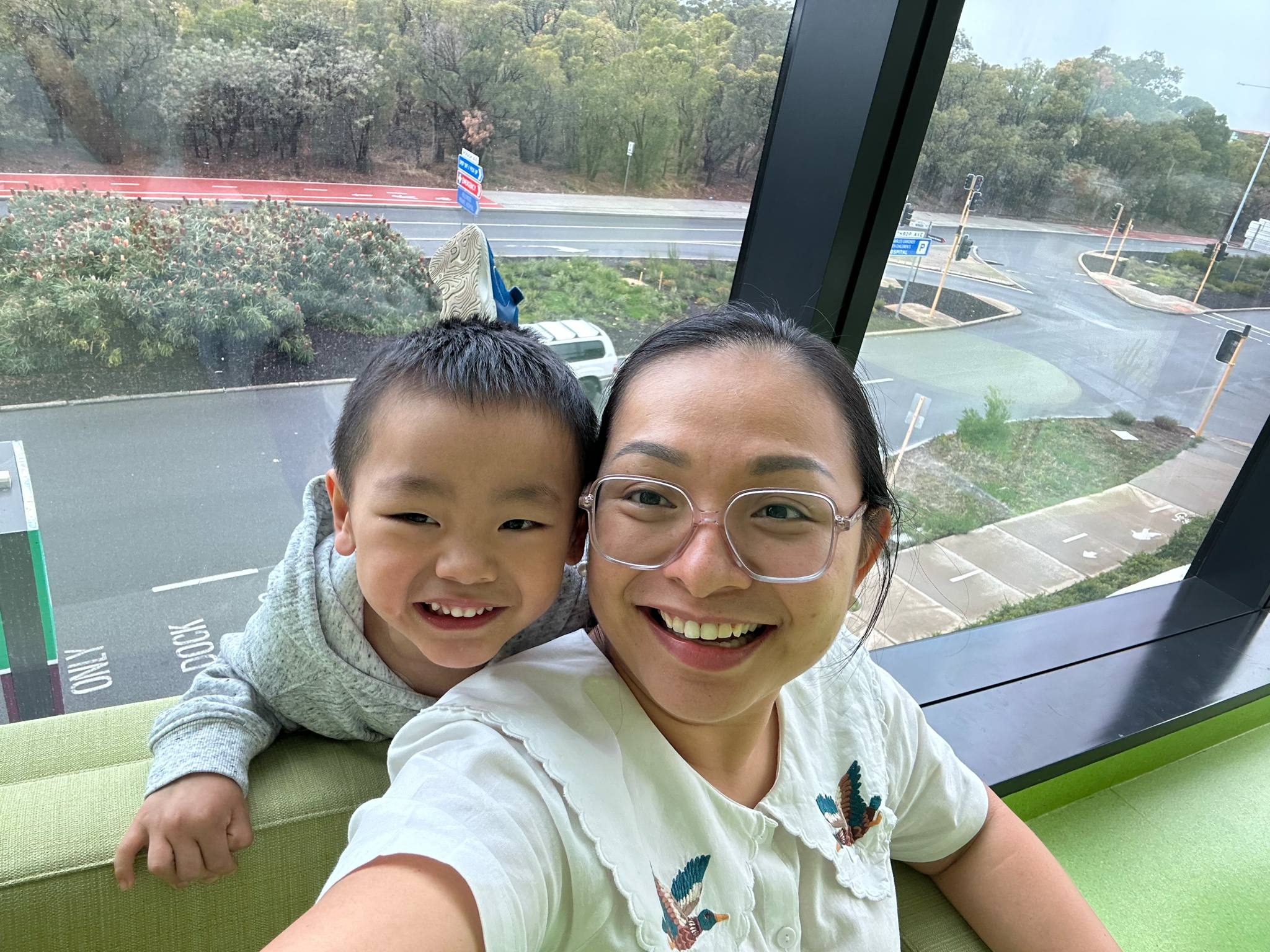 Photo of Trang's mom holding baby Samuel